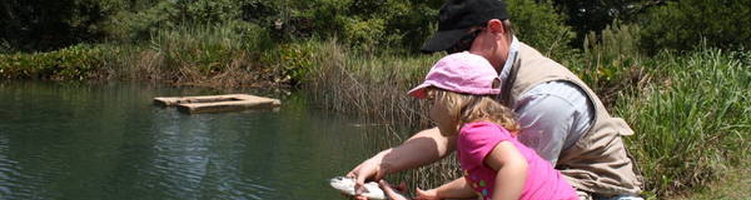 Dads and daughter fishing together on Fathers Day
